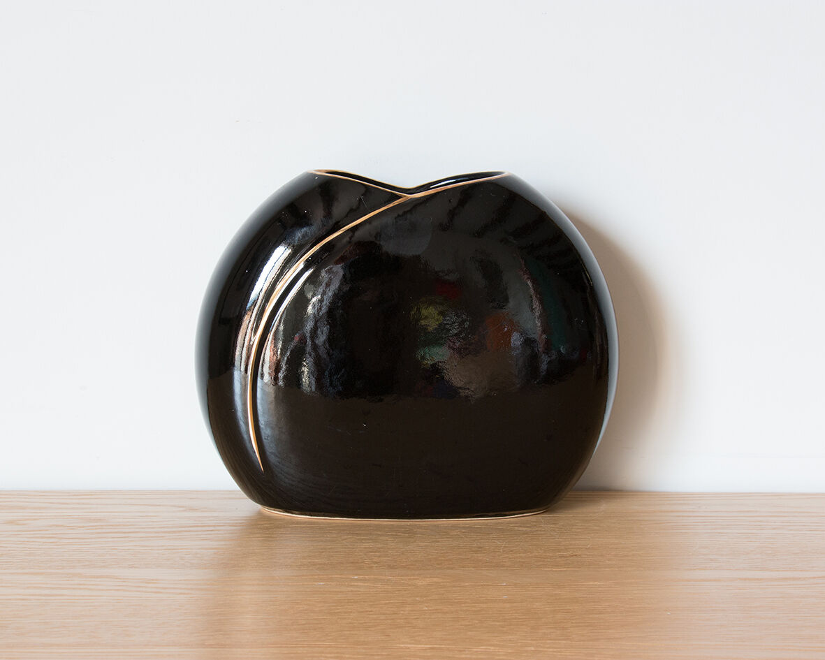 Black and gold vase