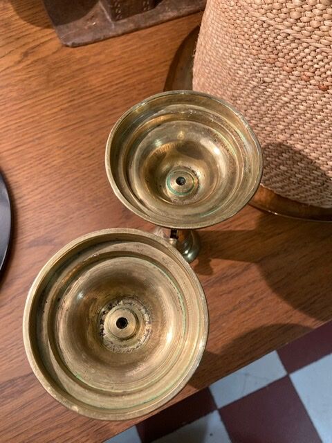 Pair of 19th-century brass pusher candlesticks