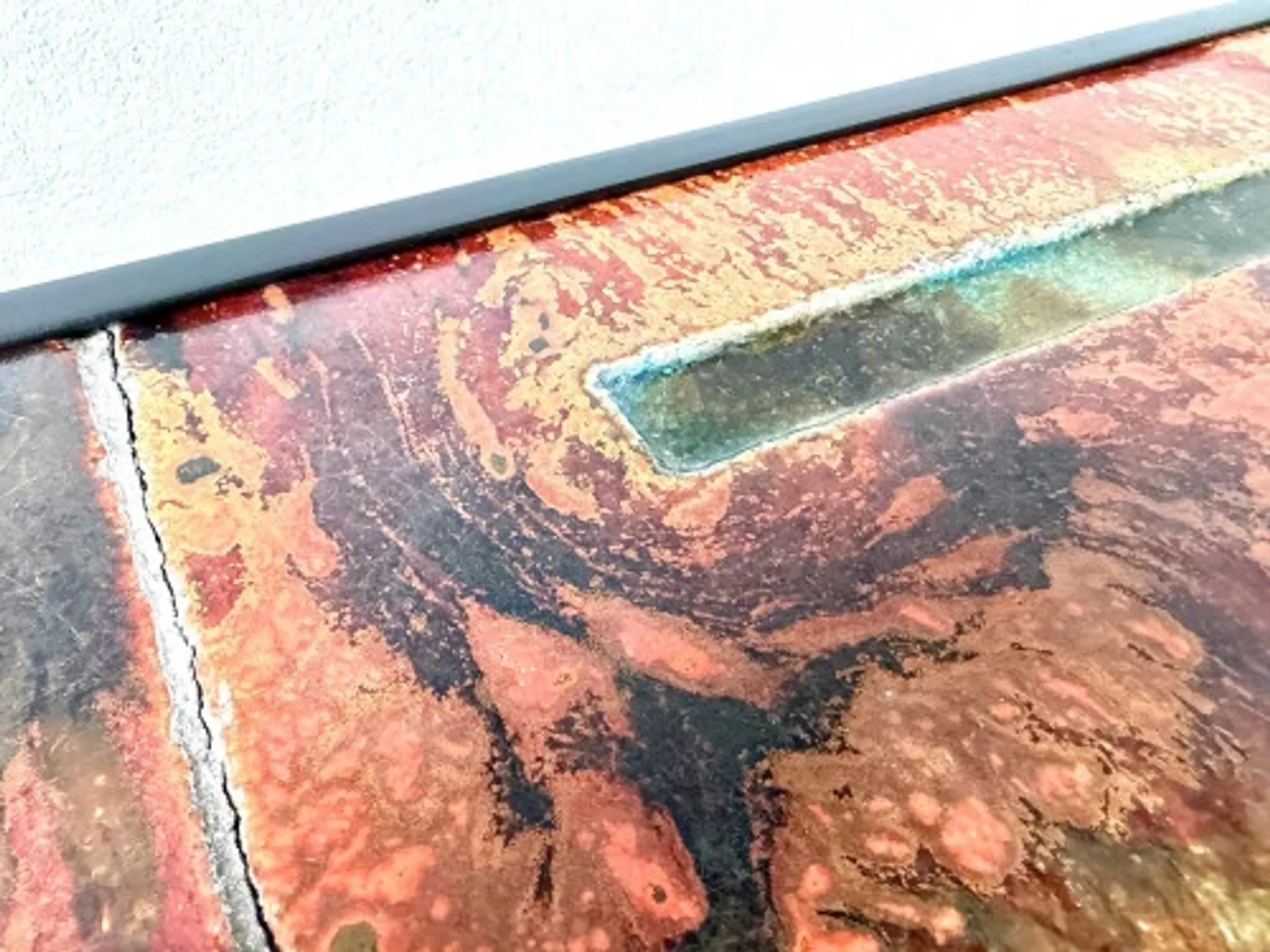 Coffee table by Robert and Jean Cloutier in enamelled lava and metal, 1950s.