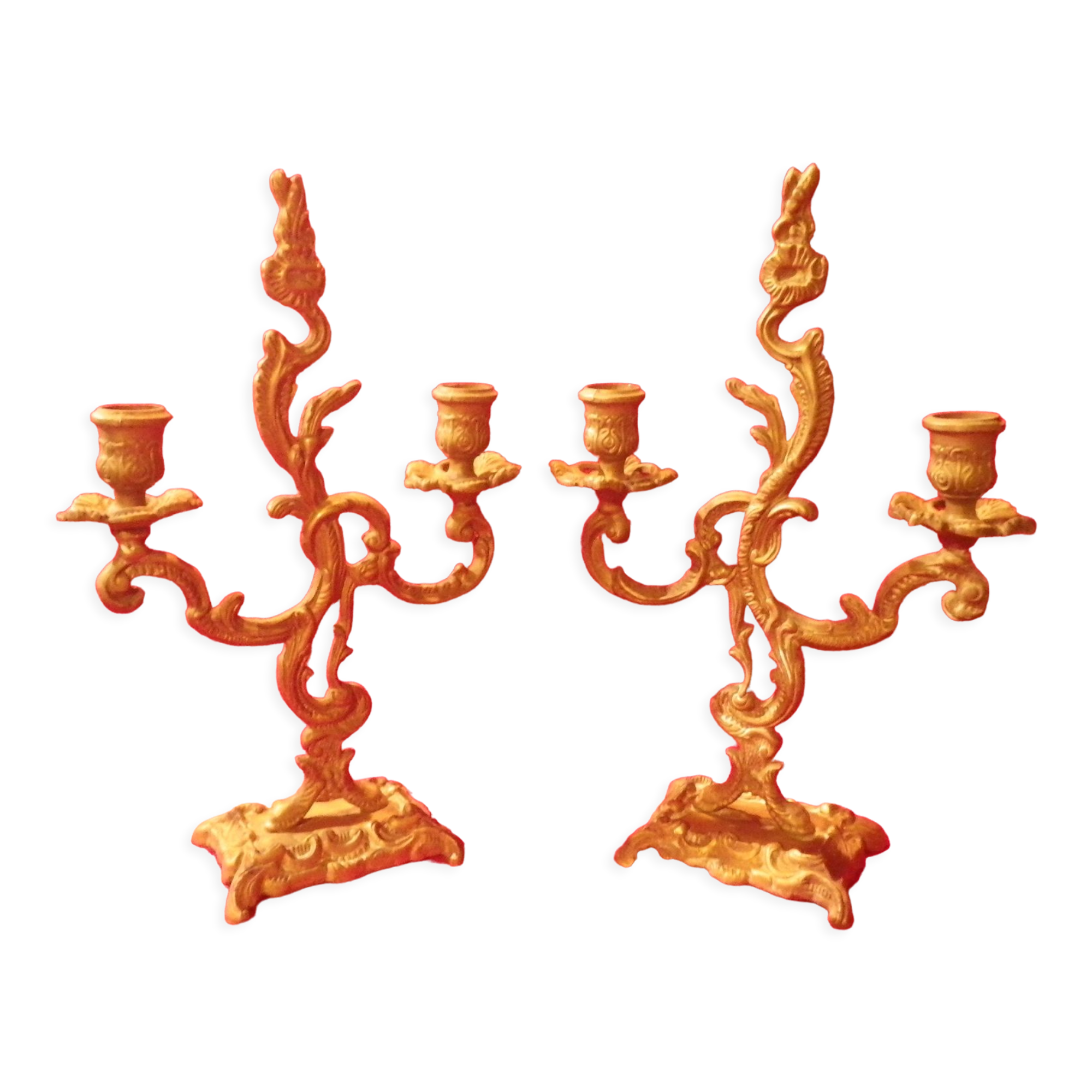 Two brass NCIAN candlesticks
