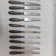 12 ebony handled knives, 1950