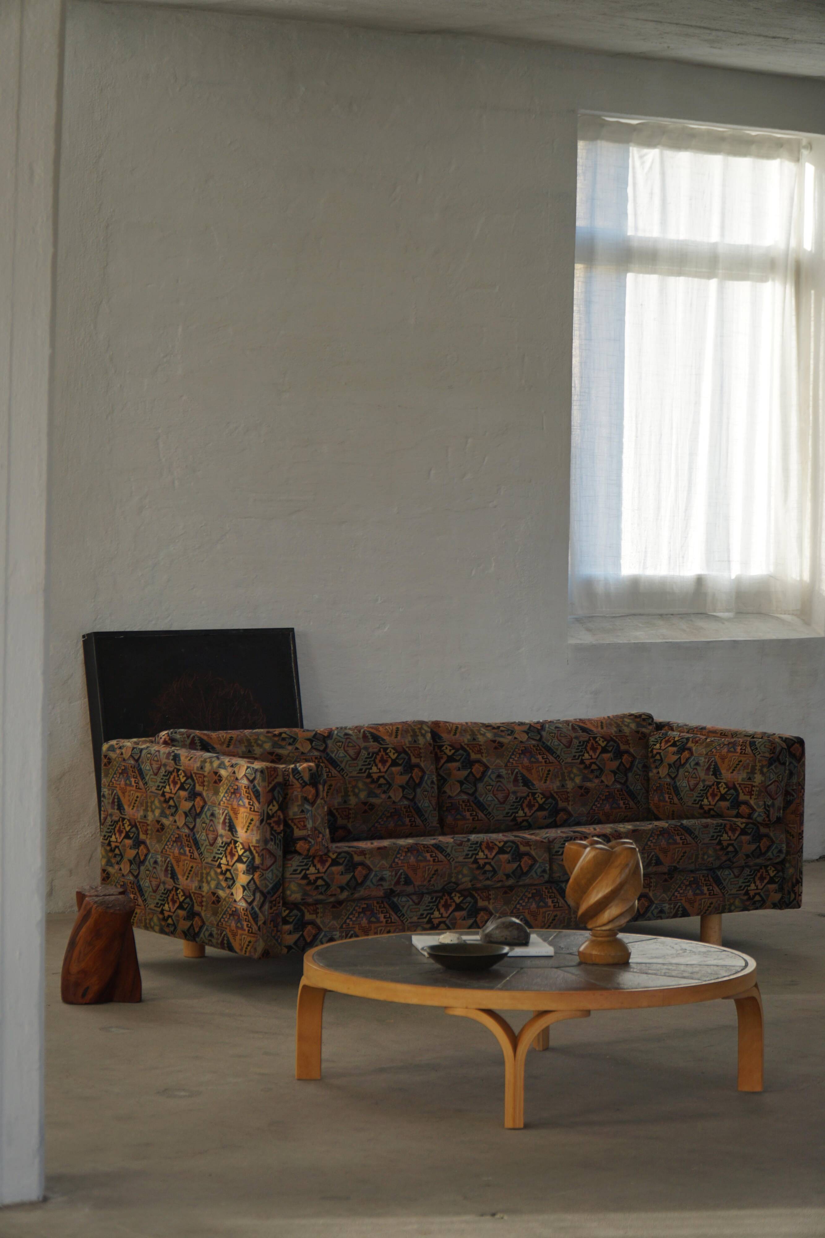 Mid-20th century modern Danish coffee table, wooden frame and ceramic top.