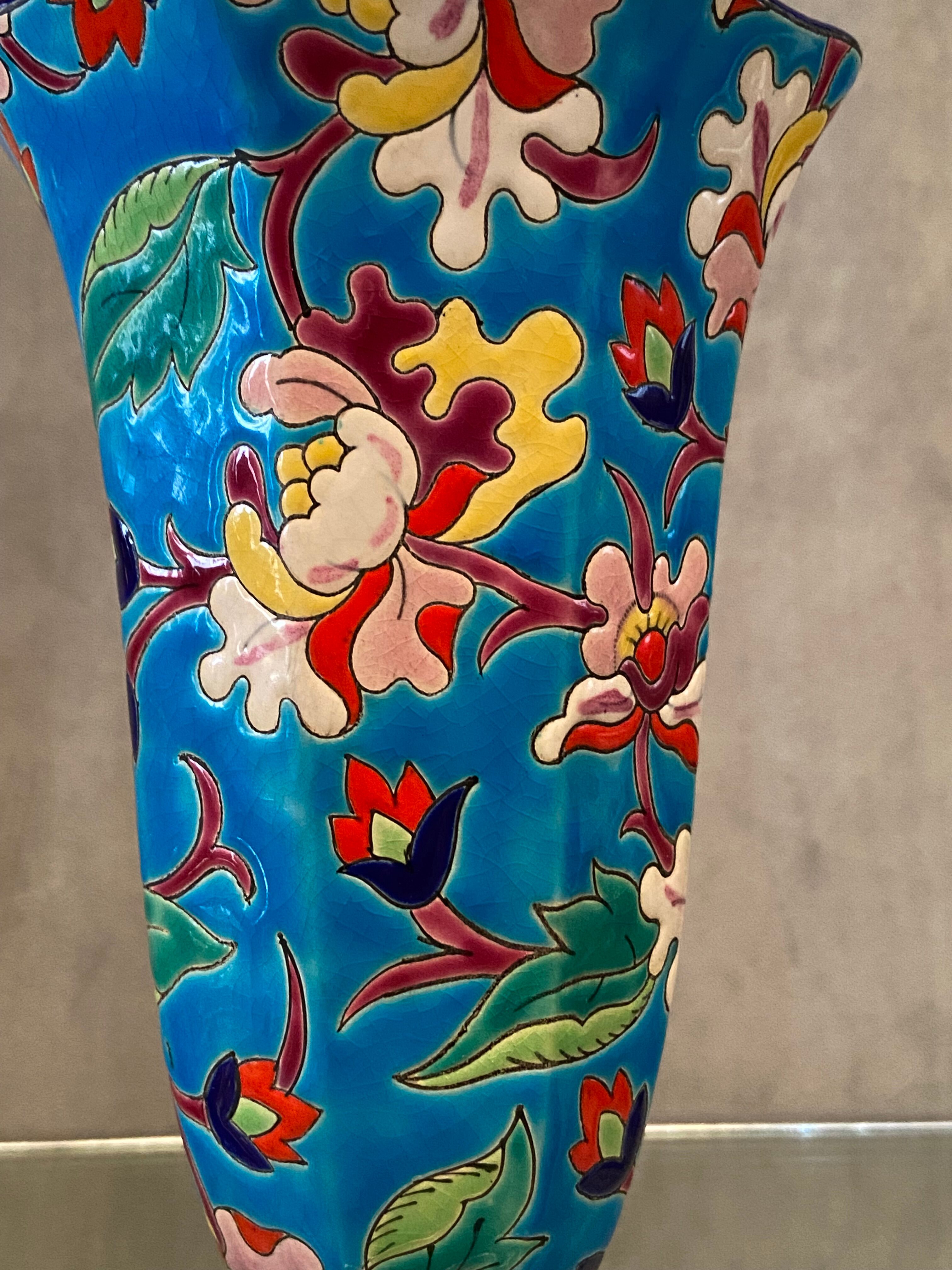 Faience cornet vase with floral decoration signed Emaux de Longwy