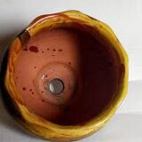 Old provencal pot cover in glazed terracotta