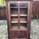 Armoire vintage parisienne à 1 porte vitrée en chêne massif.