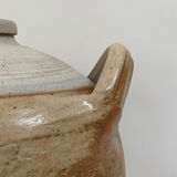 Ancient jar in varnished sandstone