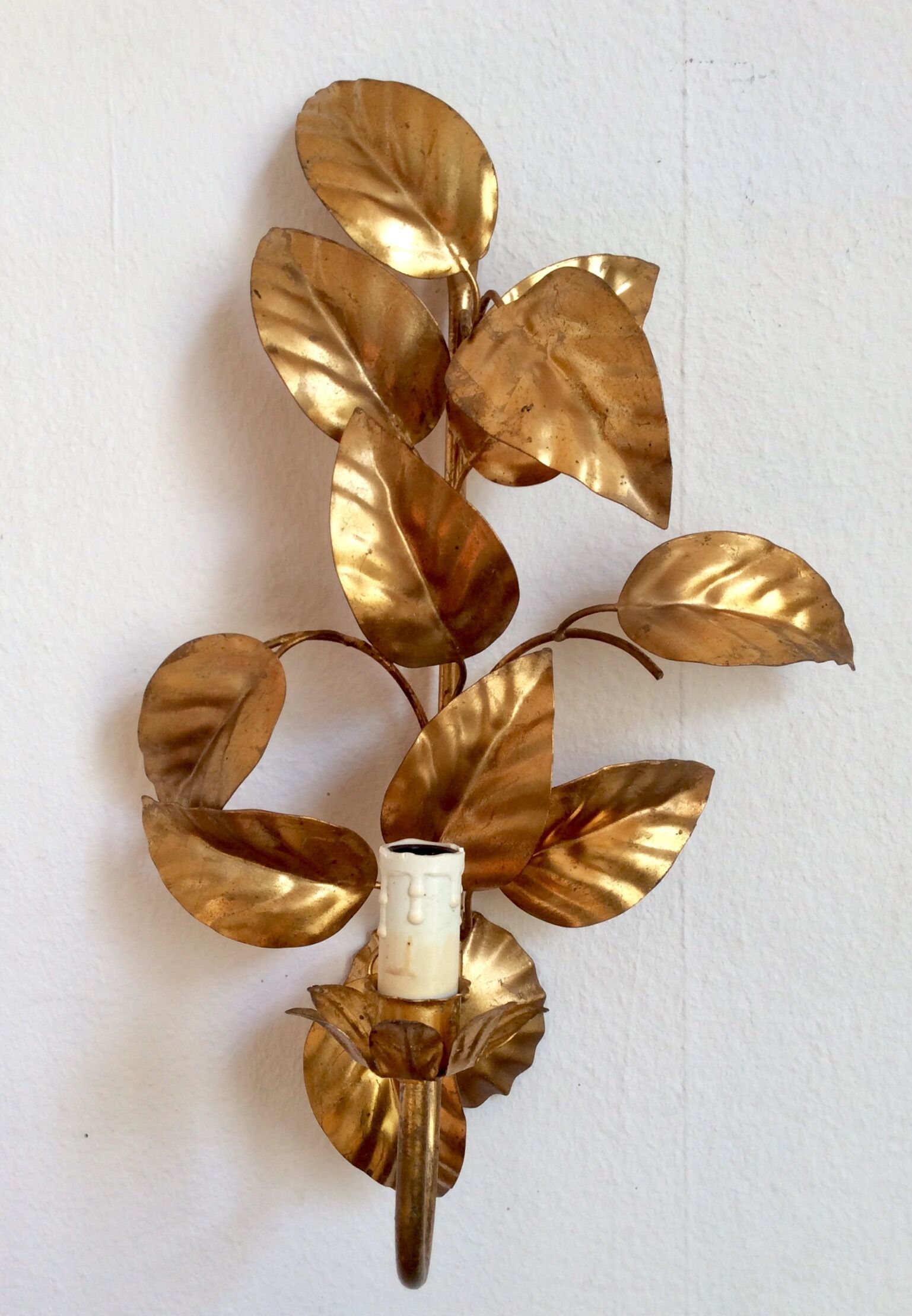 Apply gold metal sheets, Hans Kolg