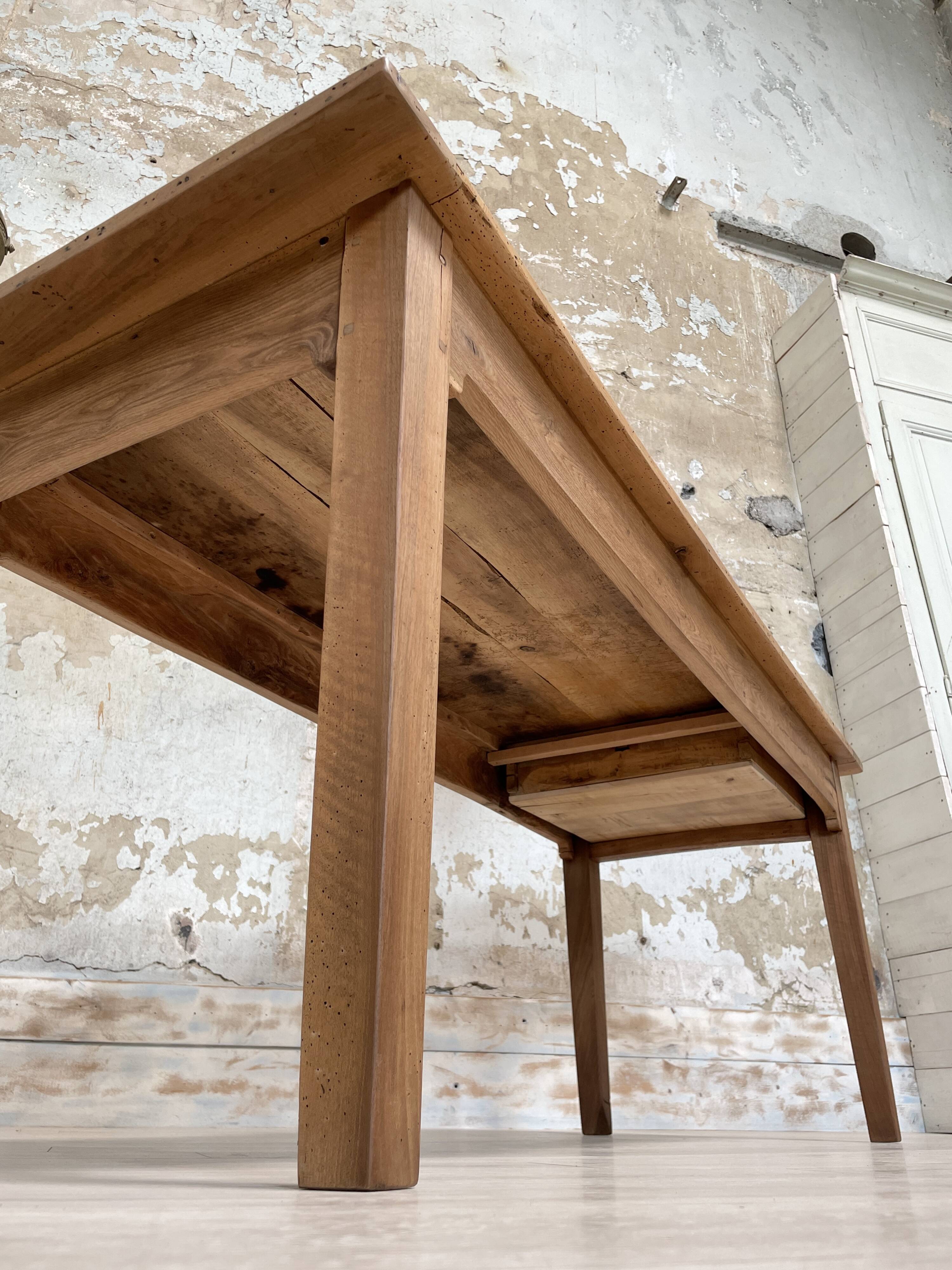 Vintage farmhouse table with spindle legs.