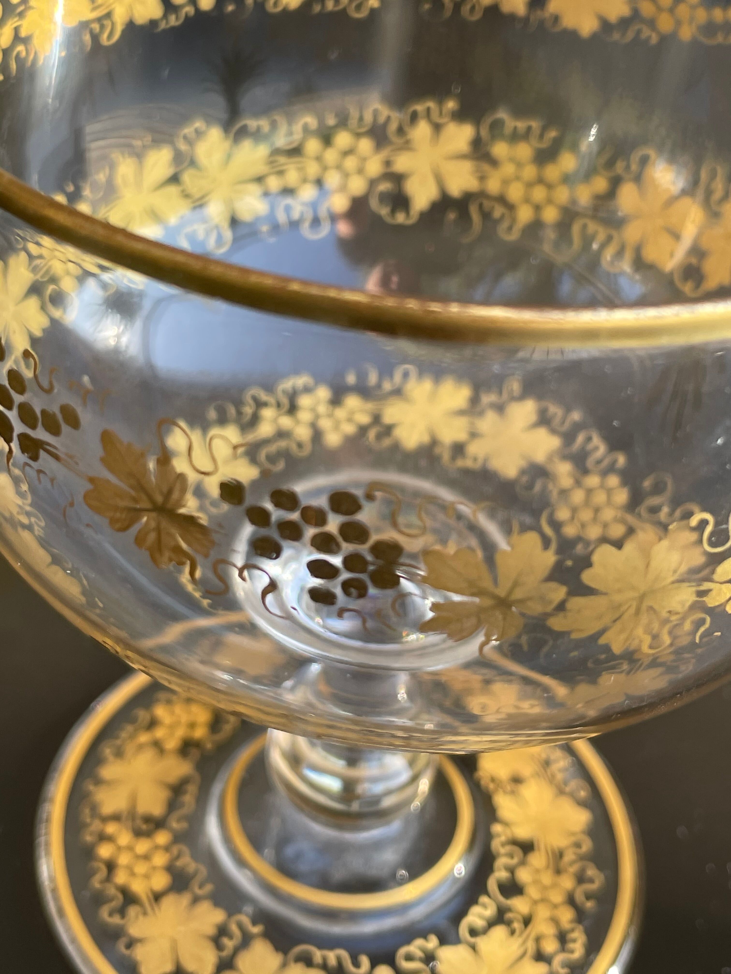 Glass cup decorated with golden vine decoration