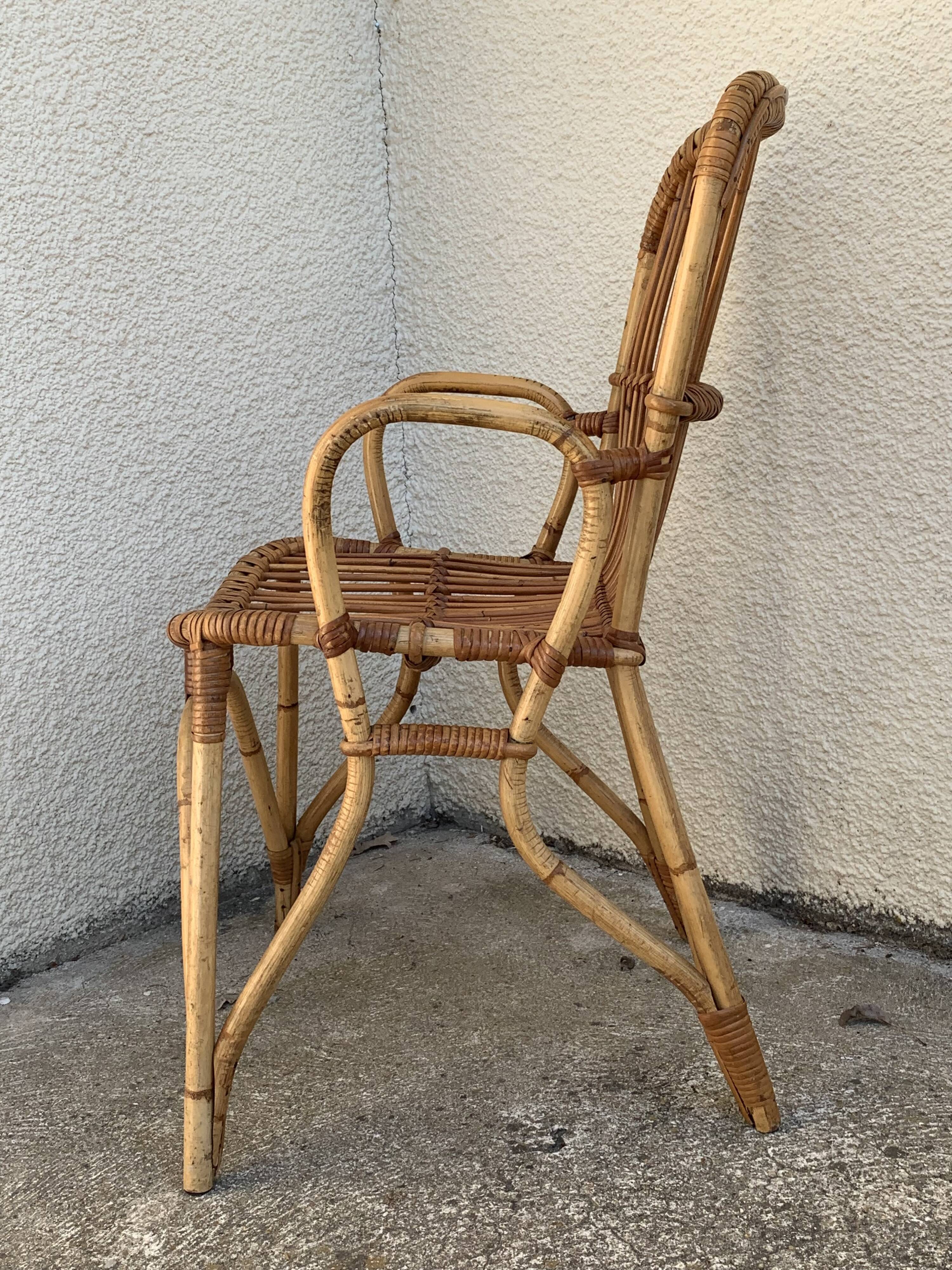 Chair and armchair in vintage rattan 1950