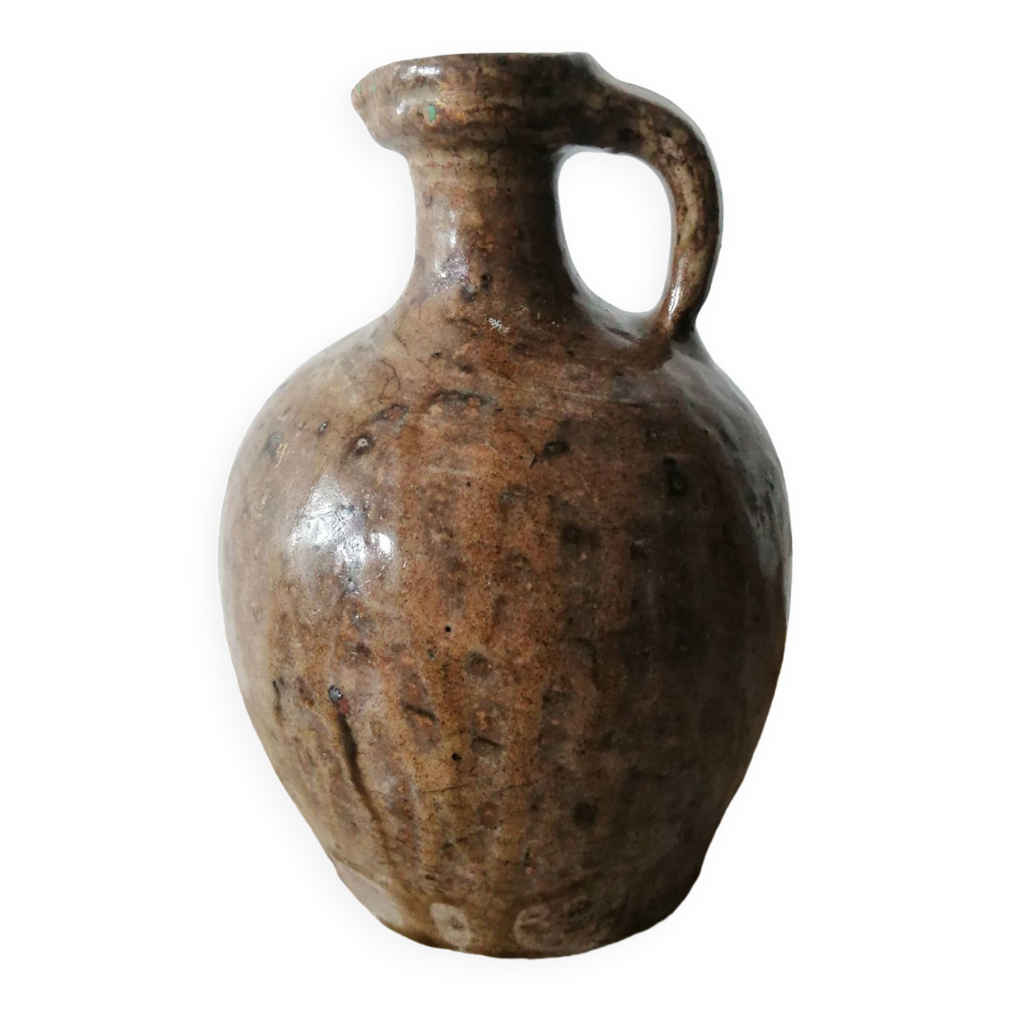Small very old glazed jug