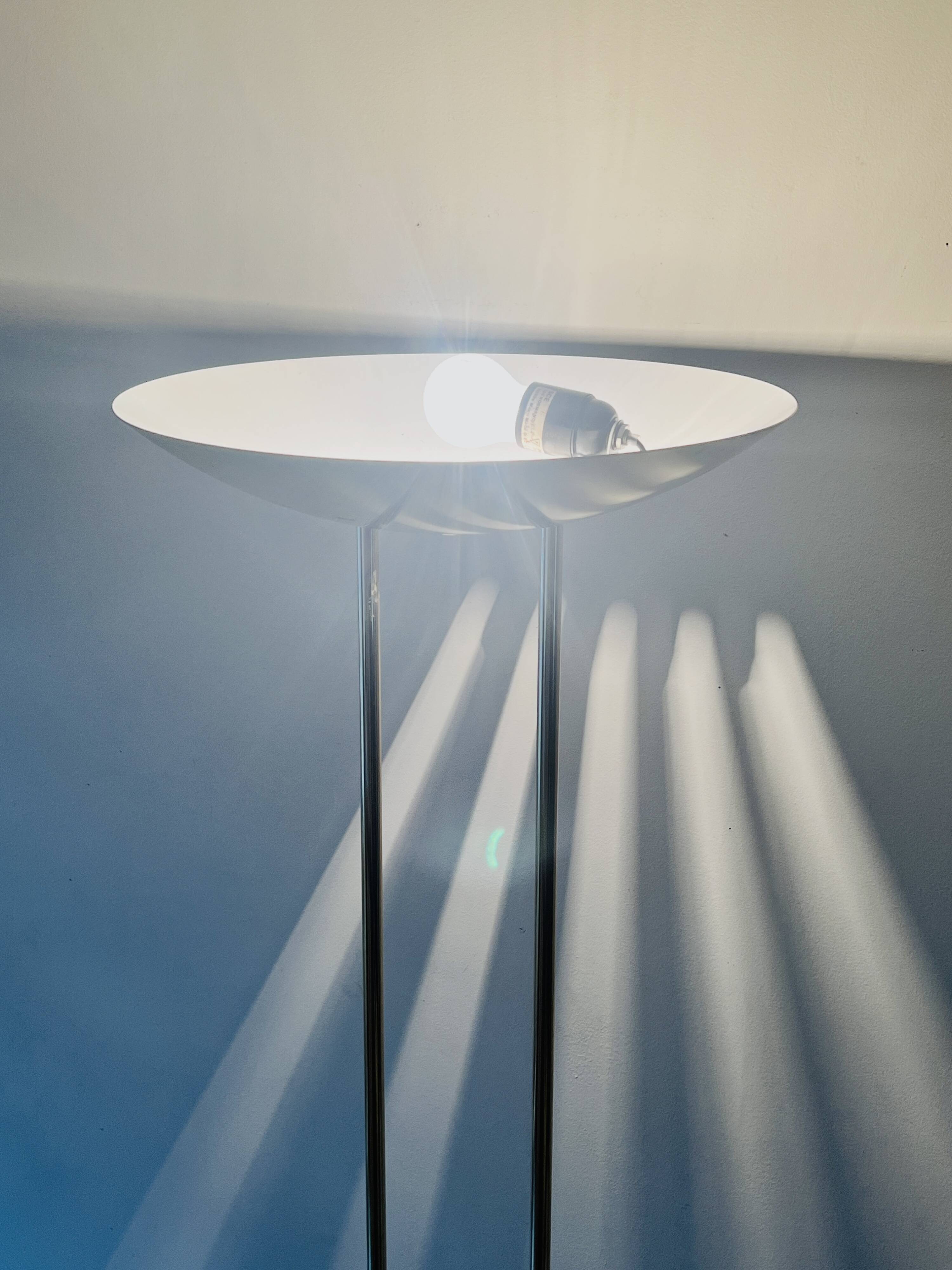 Modernist halogen floor lamp with a gold bowl, 1980.