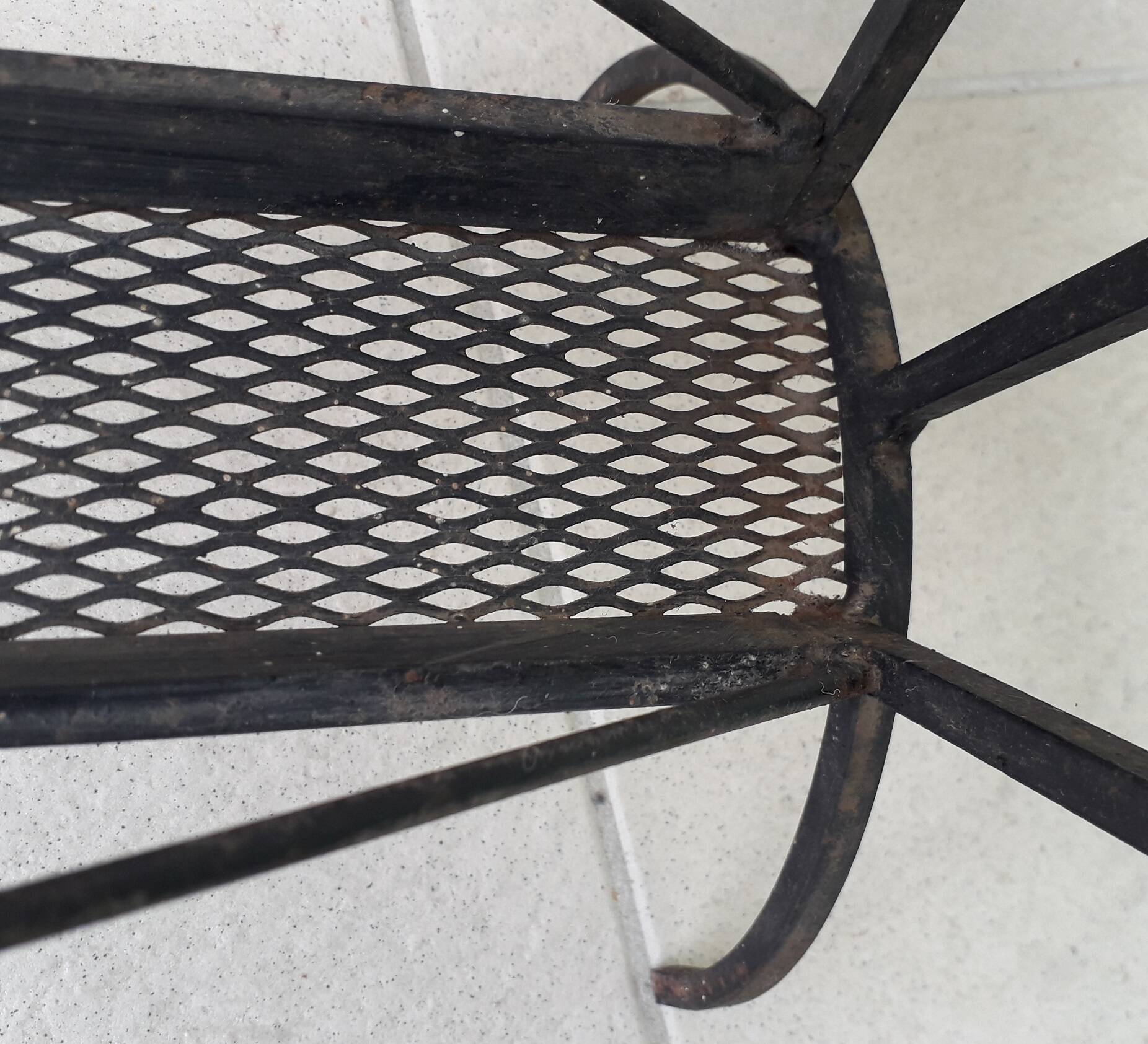 Iron side table with magazine rack