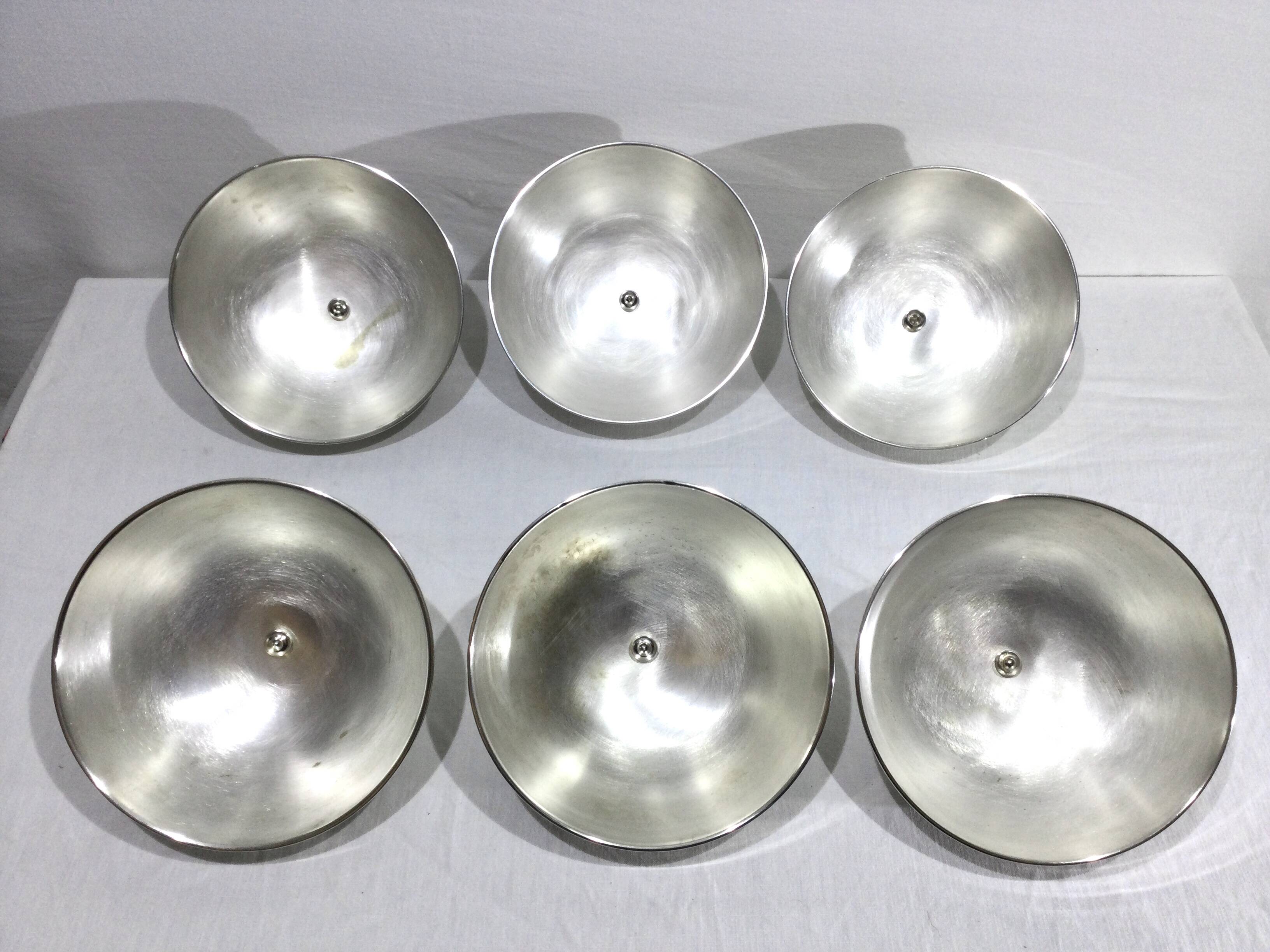 Set of silver-plated serving dishes and bells