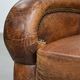Charming and comfortable vintage armchair in grained cowhide leather with character
