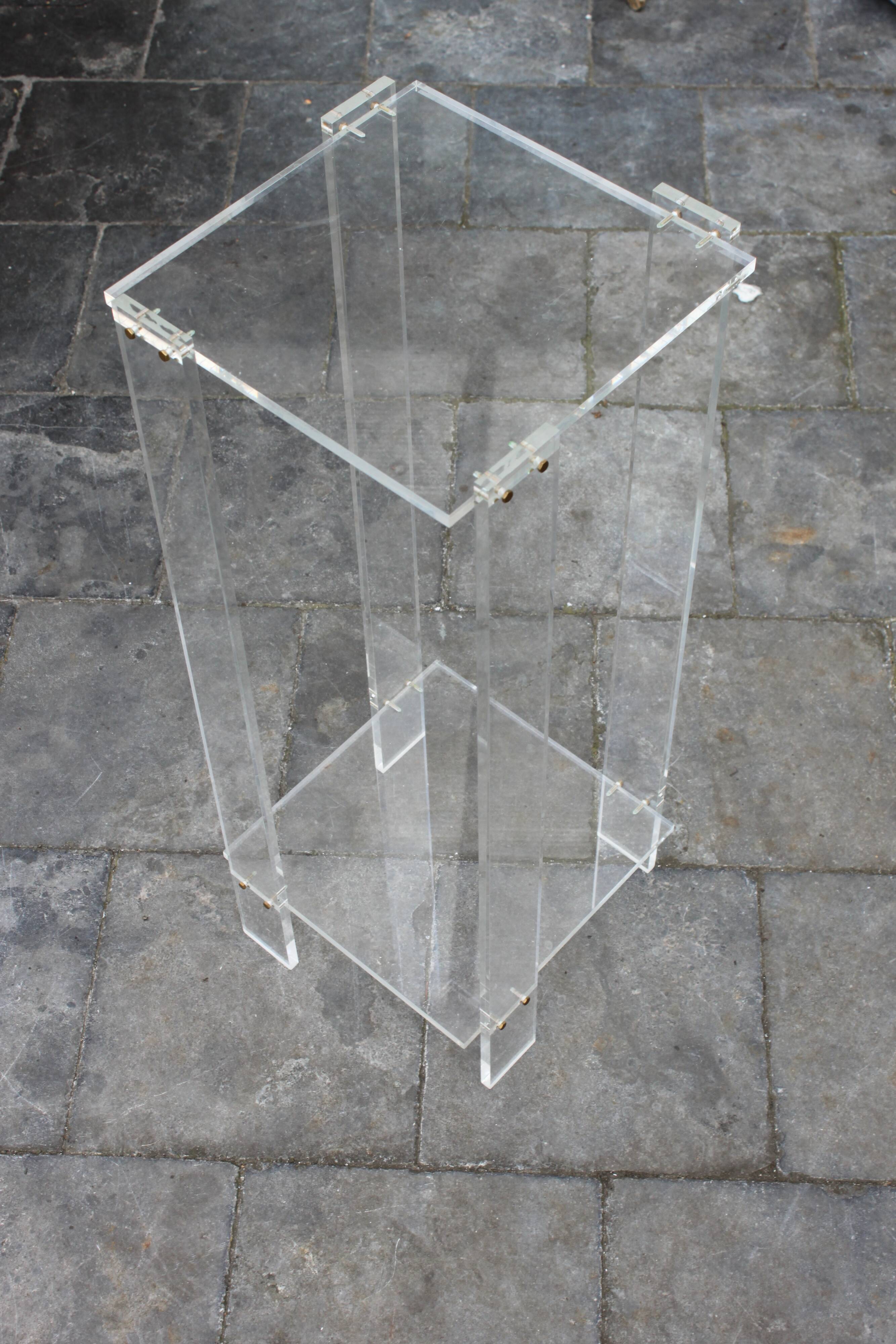 Tall lucite sidetable, 1970s.