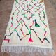 Handmade Berber wool rug: Moroccan Azilal style, colorful patterns