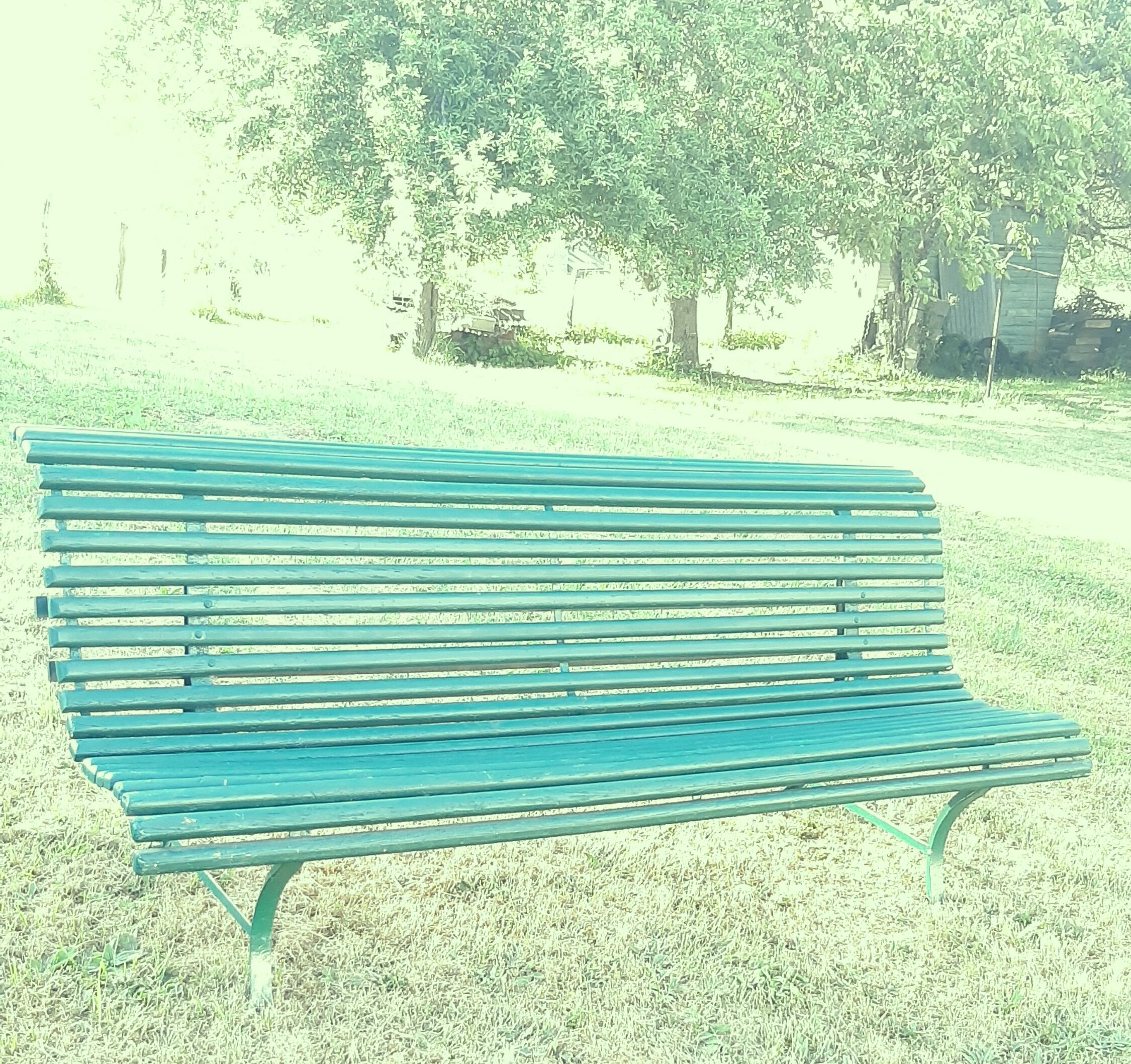Garden bench with wooden and iron slats