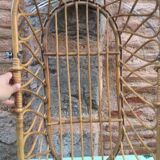 Rattan bassinet with hood arches