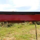 Dining table with red formica extensions