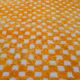 Yellow and white checkered Berber rug
