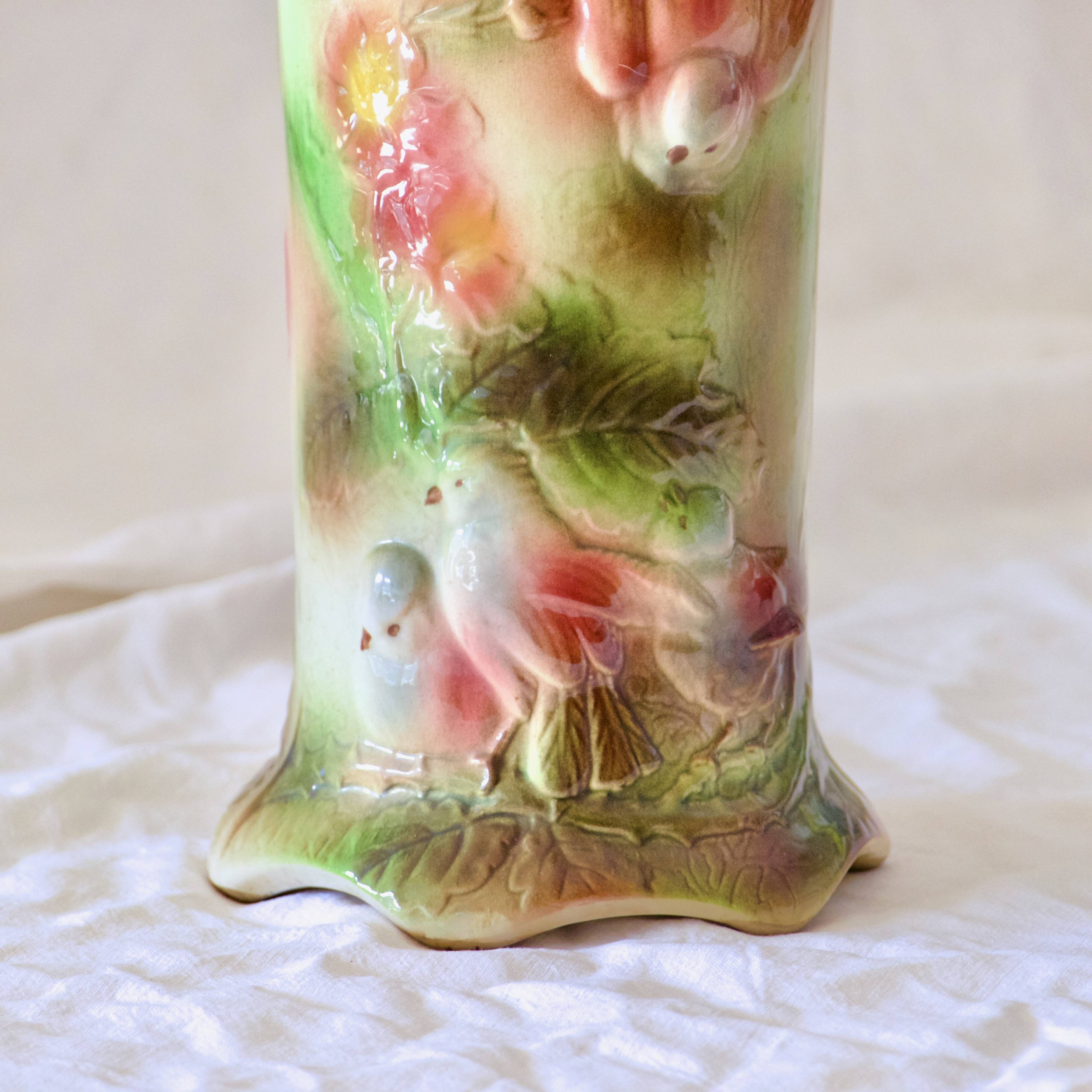 Antique Saint Clément slip roller vase with bird decor