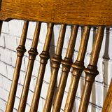 Wooden armchair with high back