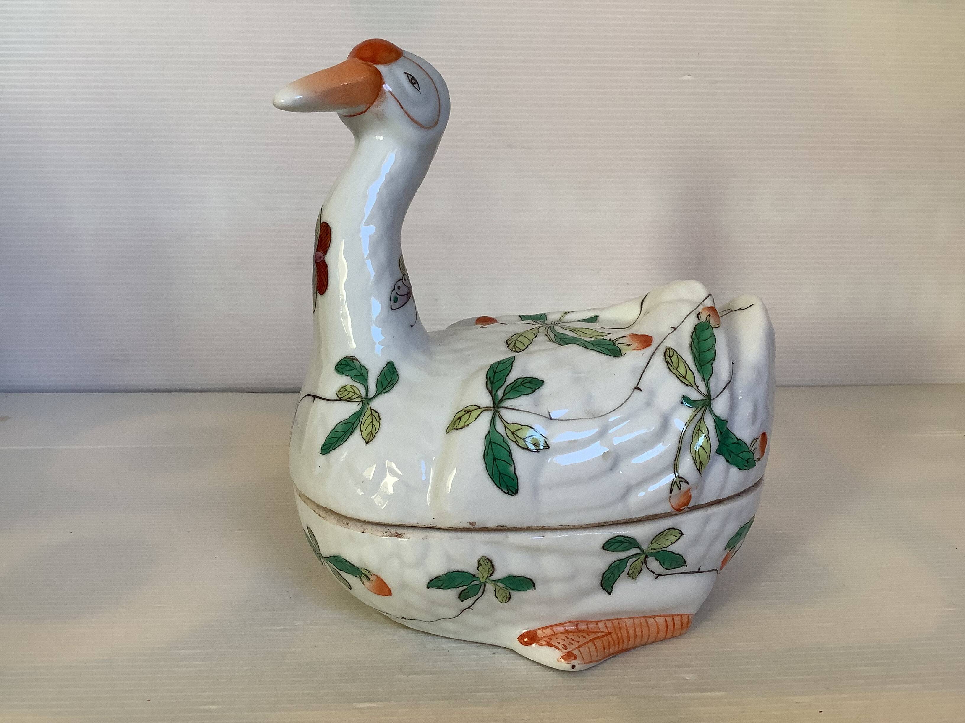 Large bird pocket emptier with butterflies and flowers.