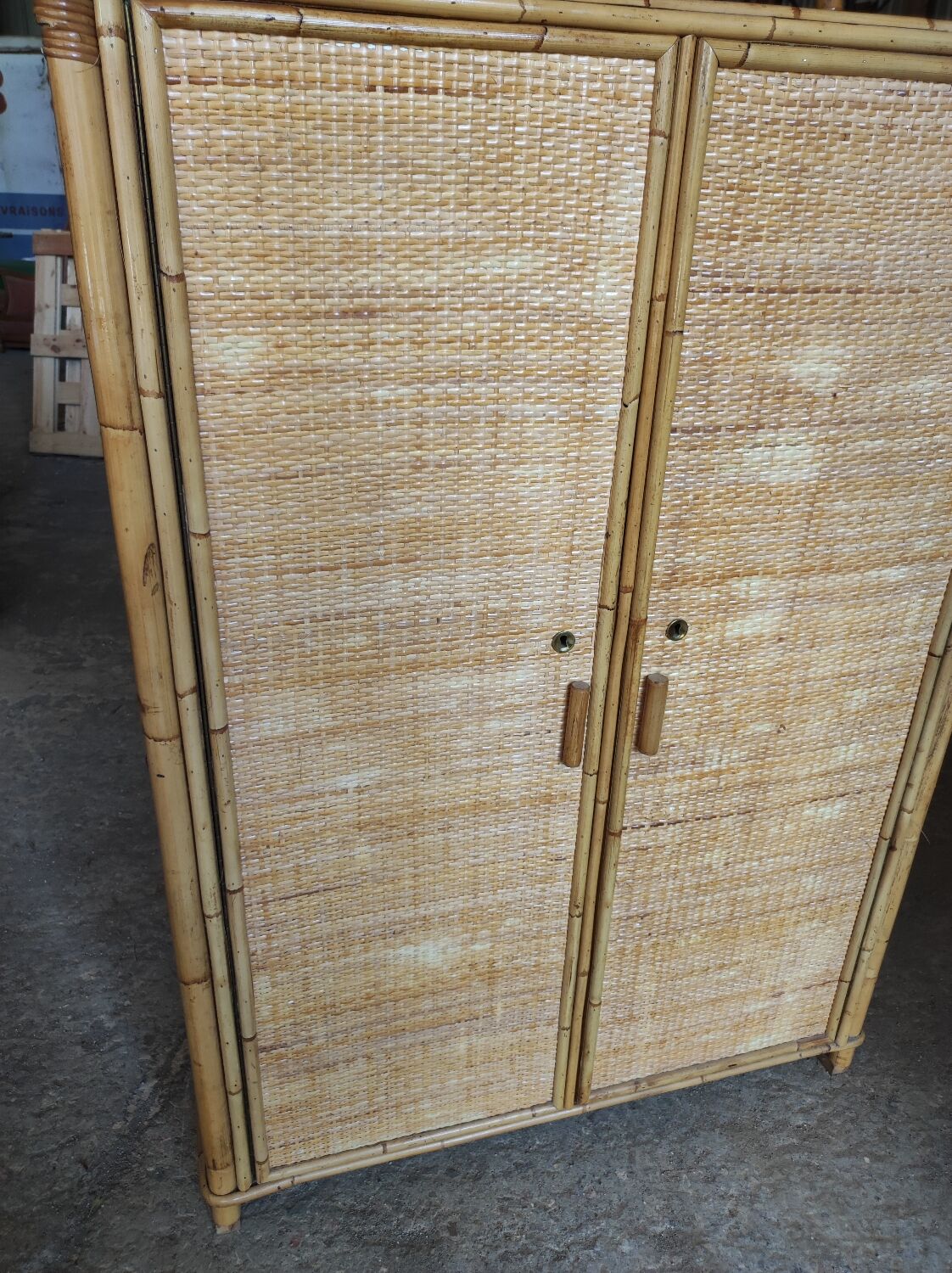 Two-door wicker and bamboo wardrobe