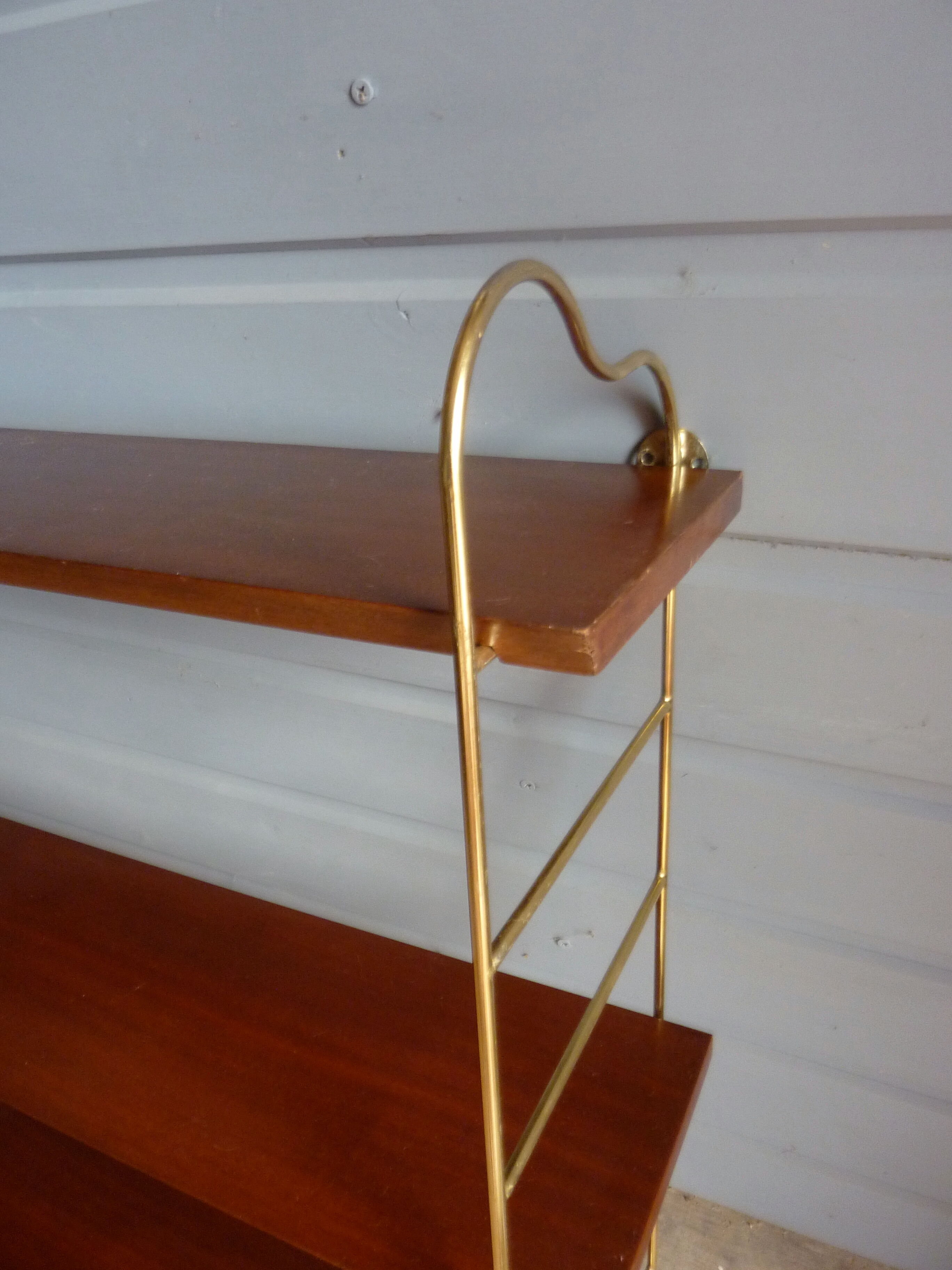 Wall shelves in brass and teak of the 1960s