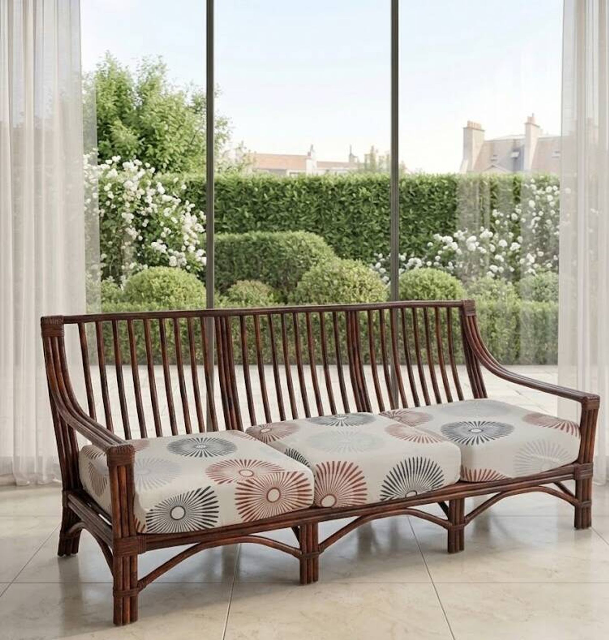 Vintage salon Maison Maugrion in rattan with leather and feather finishes.
