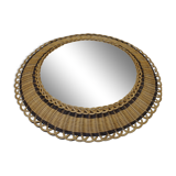 Vintage round mirror in a wicker frame