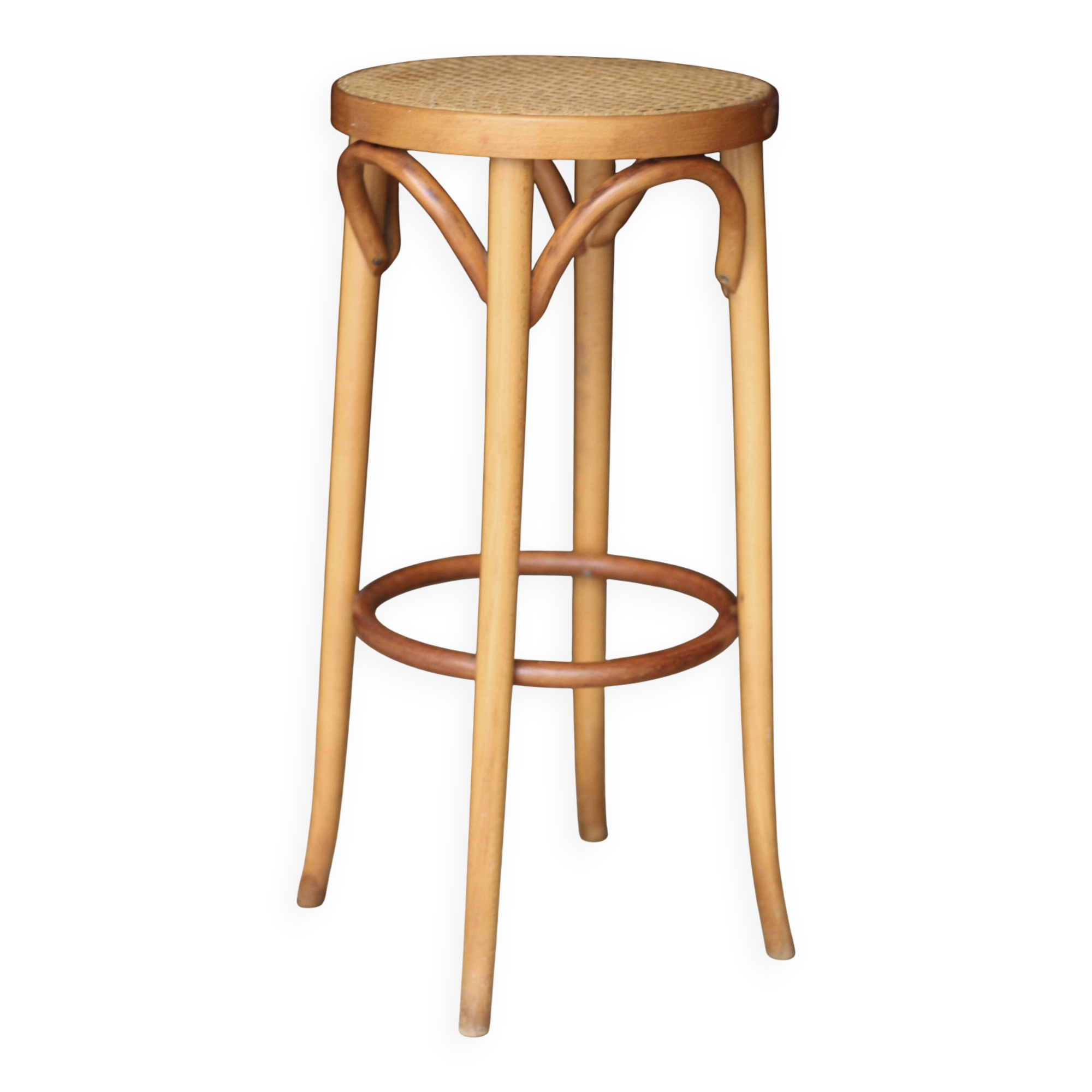 Beautiful caned stool in curved blond wood. 1940s/1950s