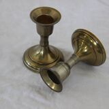 Small golden metal candle holders