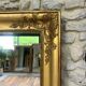 Antique fireplace mirror 144.5cm/131.5cm gold leaf and mercury