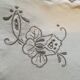 Round off-white tablecloth embroidered with grey flowers with 8 matching napkins - festive table
