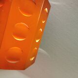 Danish Space-Age hanging lamp from the 80s, made in orange metal with cut-outs.