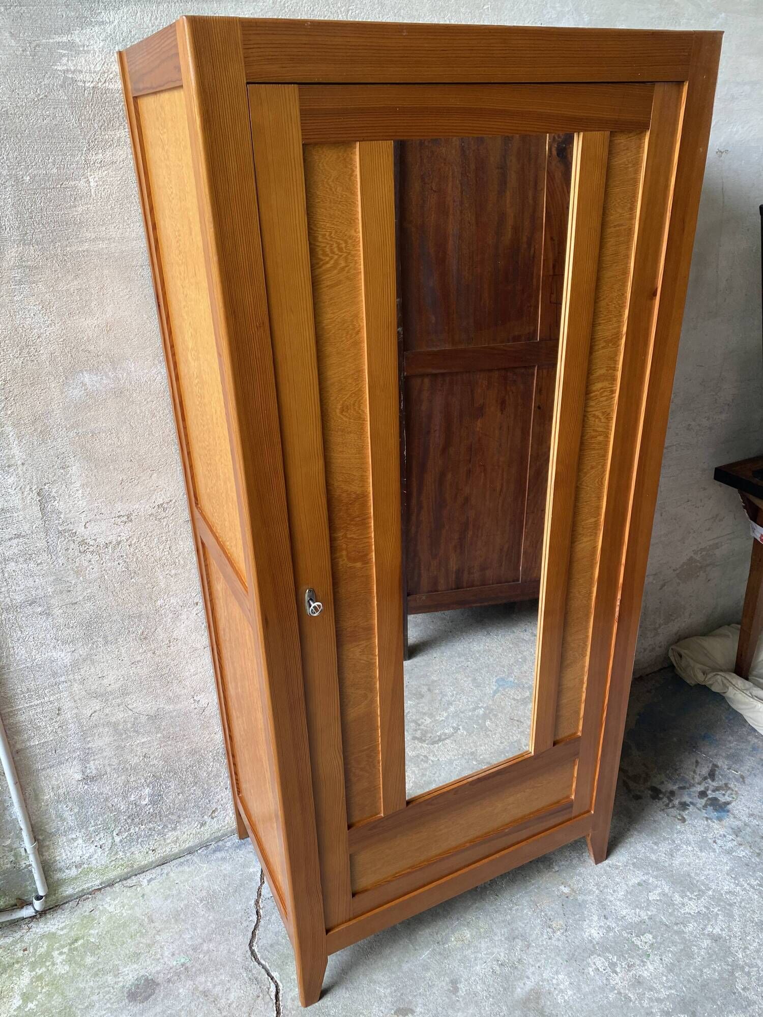Vintage Parisian wardrobe with one mirrored door from the 60s in pine and wood