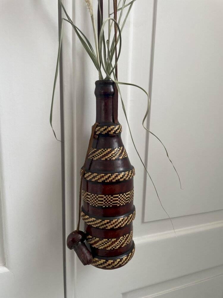 Leather-covered bottle