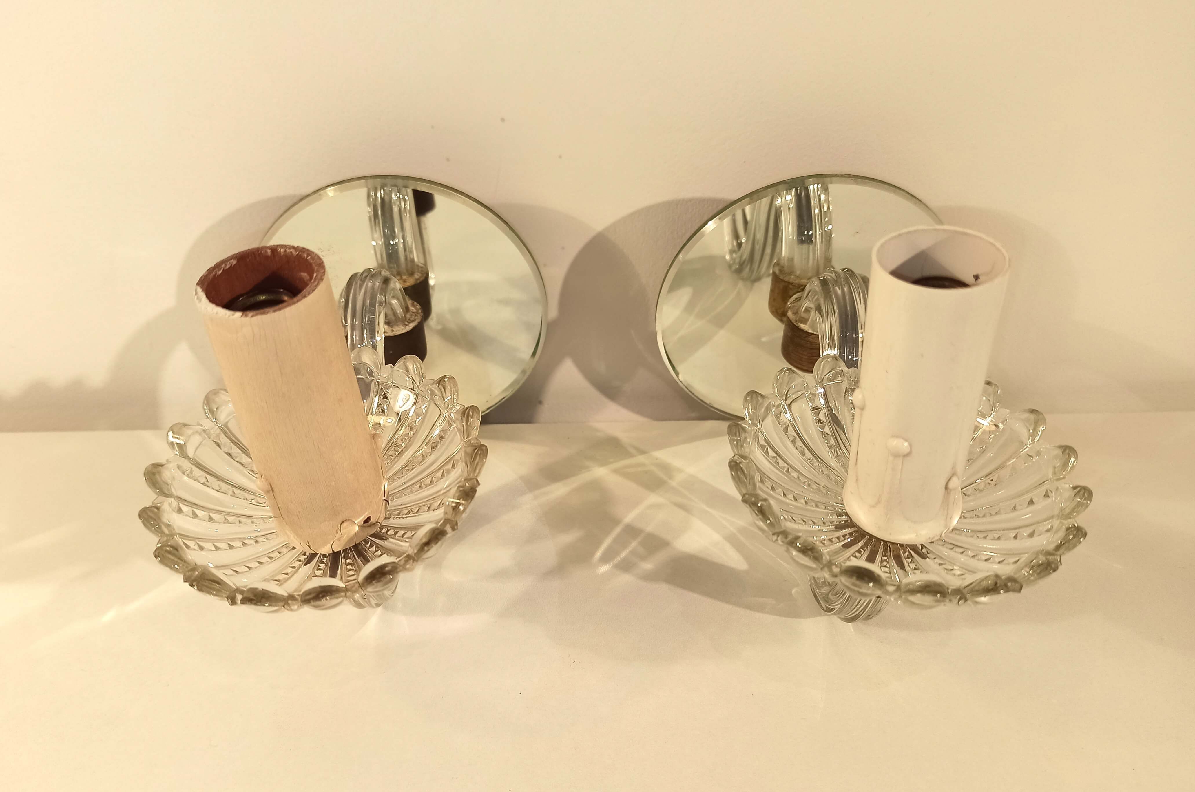 Pair of old glass  wall light and mirror vintage twisted arms