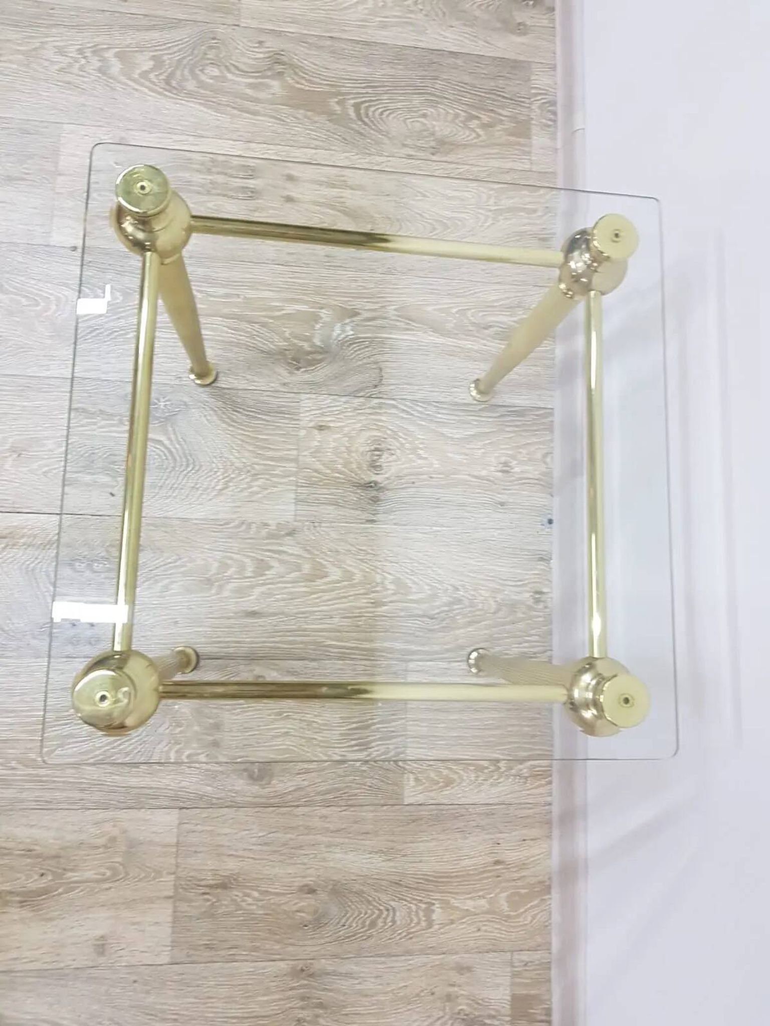 Side table, gold-tone brass, clear glass, France, 1960s.
