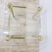 Side table, gold-tone brass, clear glass, France, 1960s.