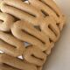 Handcrafted ceramic wall light in raw stoneware inspired by Mid Century design.