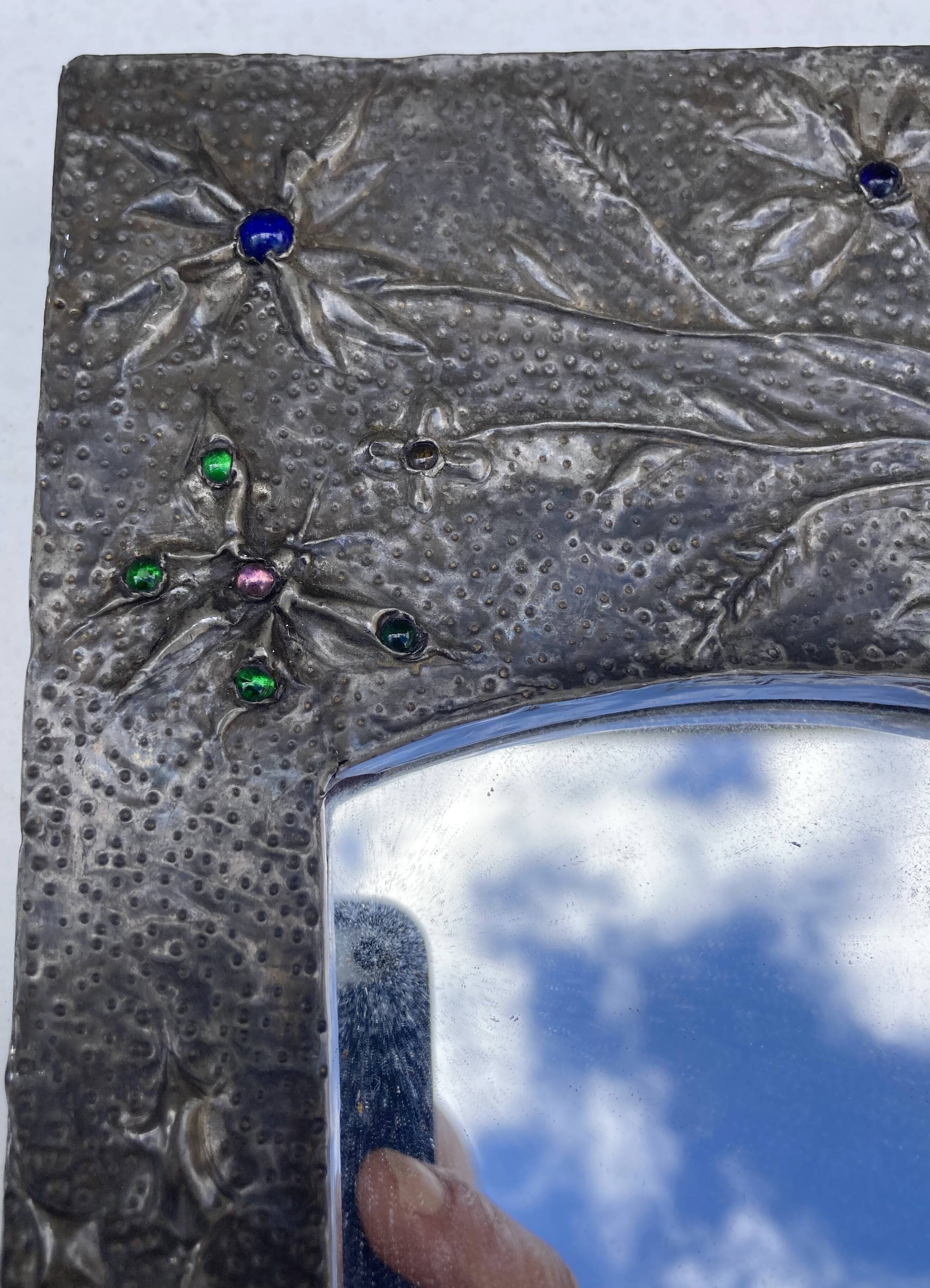 Mirror with embossed metal frame by alfred daguet, 1900s art nouveau period