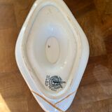 Ancienne saucière réparée avec la technique japonaise du kintsugi