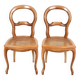 Paire de chaises cannées, en bois