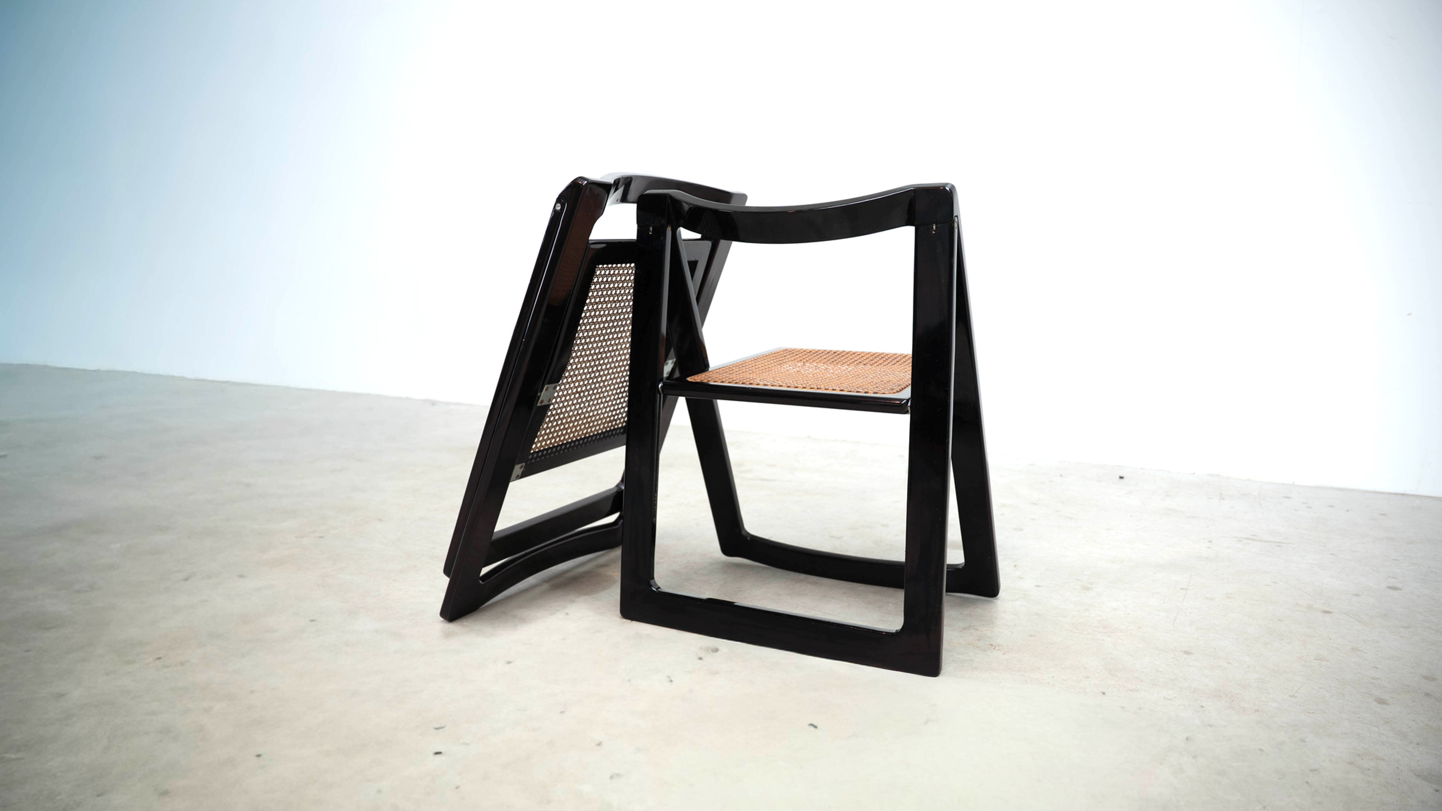 Set of eight folding dining chairs designed by Aldo Jacober for Alberto Bazzani