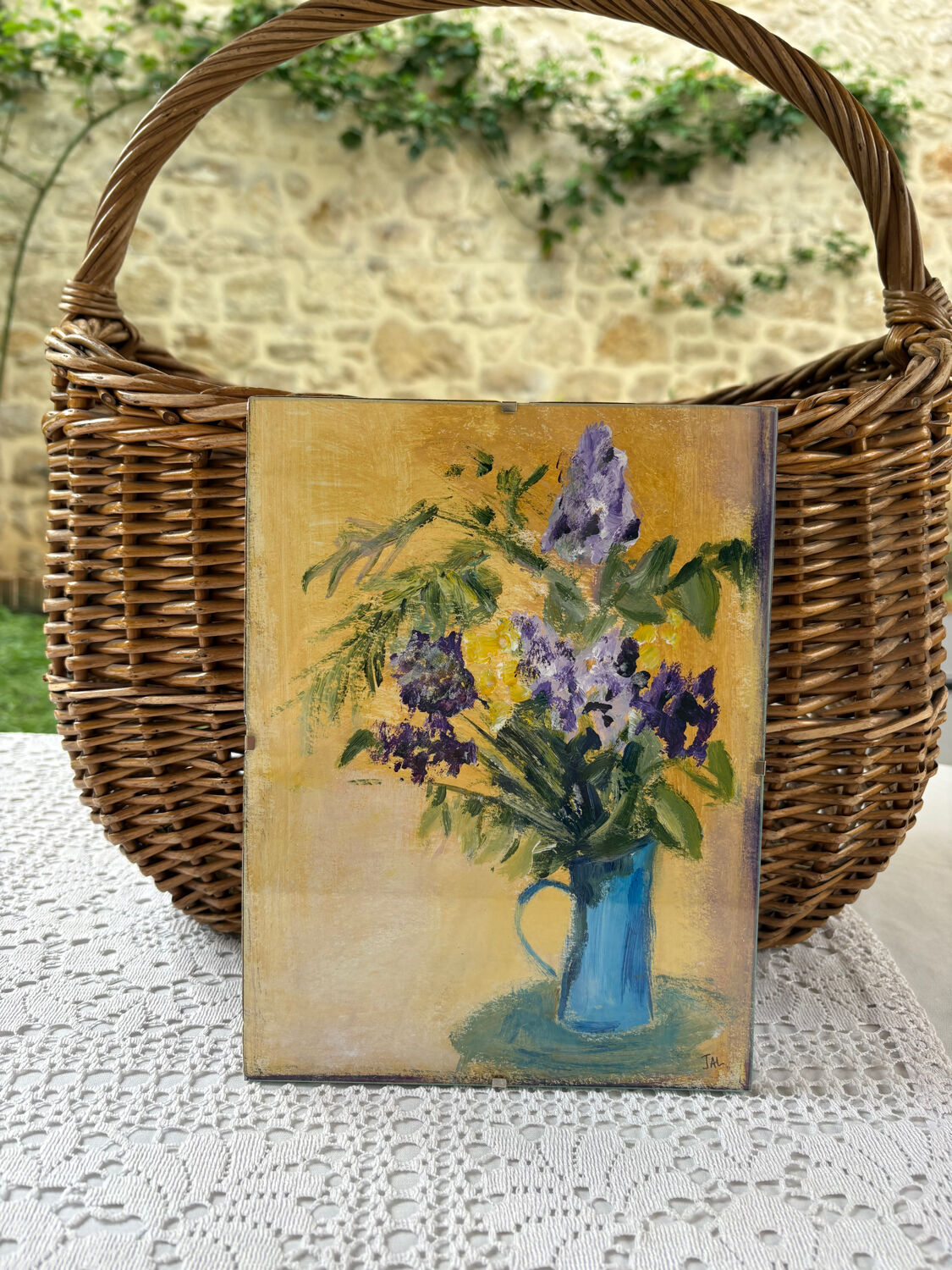 Acrylic painting of flowers in a jug.