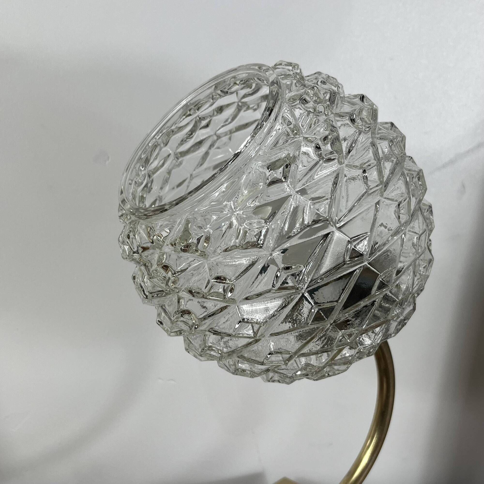 Pair of antique wall sconces with swan necks and glass globes.