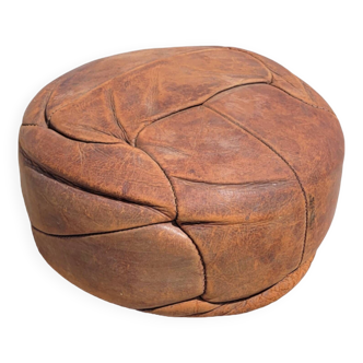 Small handcrafted pouf in cognac leather